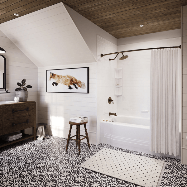 A vintage bathroom with mosaic tile floor, wooden ceiling and turkish towels