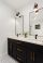 classy black bathroom vanity with golden hardware