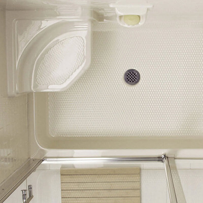 Top view of a shower with a bench