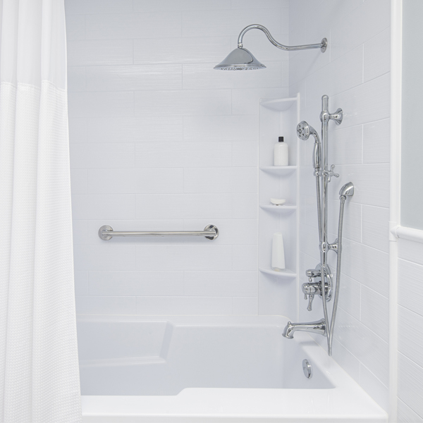 White Bath Fitter Tub with a metal grab bar